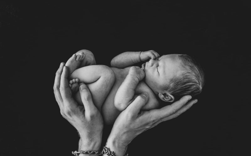 main de papa photo de bébé